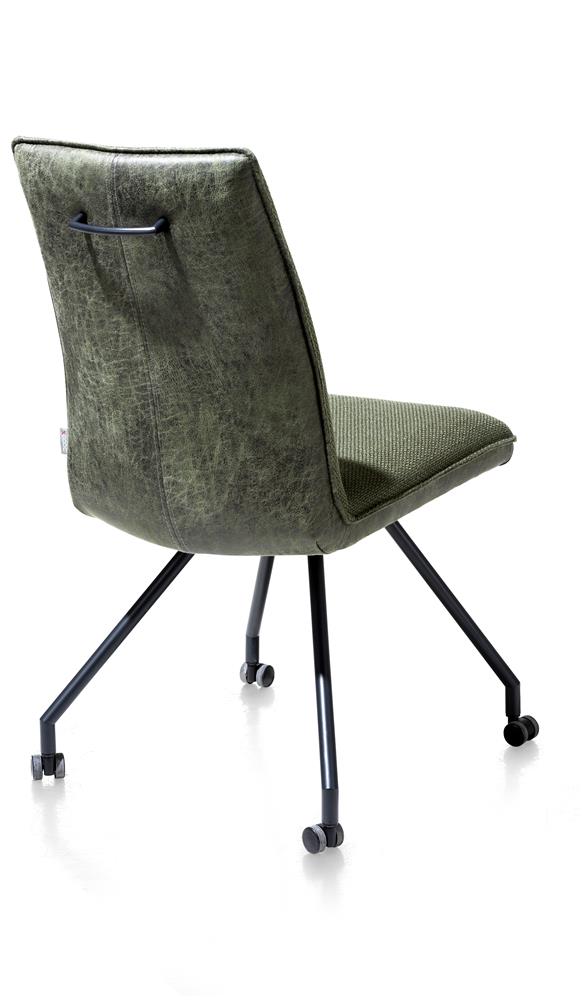 Chaise confortable sur roulettes en tissu vert