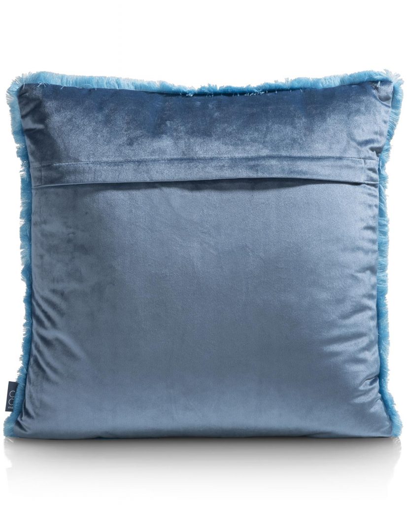 Coussin uni à franges en velours bleu