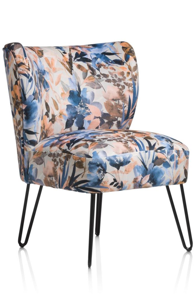 Fauteuil décoratif motif floral et coussin boule