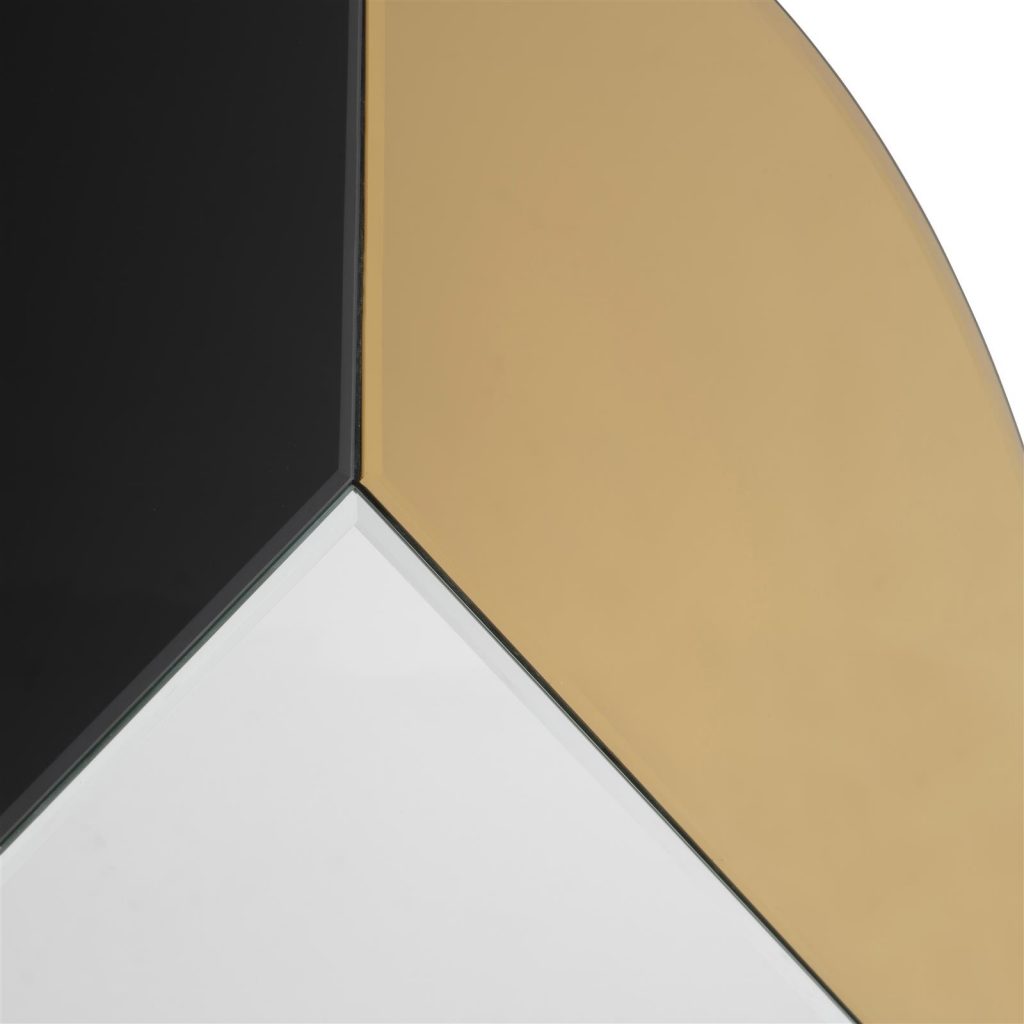 miroir rond avec deux formes noir et doré