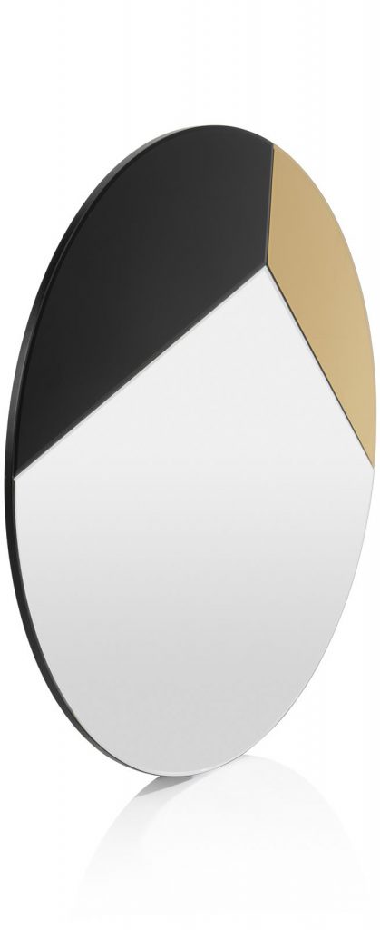 miroir rond avec deux formes noir et doré